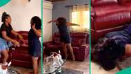 Nigerian mum rolls on floor as daughter secretly flies down to Nigeria to see her, video melts hearts