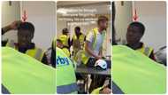 Staff of construction company surprise female colleague with gift on her birthday in video