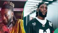 “All hail king Odogwu”: Burna Boy crowned king clinches onto a staff of office in viral video