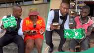 Old woman's risky choice pays off as she opens a mystery box with N400,000 on the street