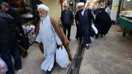 Economic pain casts dark shadow as Iranians go to vote