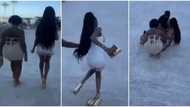 Pretty lady in very thick heels stumbles and falls flat; video stirs reactions