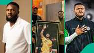 Ebuka Songs hosts Super Eagles' goalie Nwabali at his residence, presents portrait to him as gift