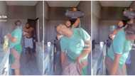 "Marry your playmate": Nigerian man disturbs wife in kitchen with JBL speaker in cute video, dances with her