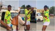 Man makes strangers happy with money, asks lady to dance on the road to Davido's Electricity
