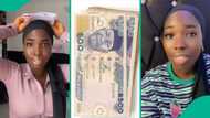Lady in tears as someone allegedly transfers stolen money into her bank account