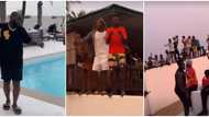Fans risk it all for Davido, climb fence to dance for singer as they discover him at private Lagos beach house