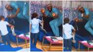 Nigerian man cries for help as his little son approaches him with snake in hand, video goes viral