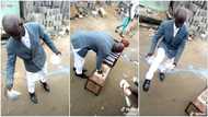 PhD in hawking: Man in suit uses skill to sell groundnut & popcorn, people watch his fast hand moves in video