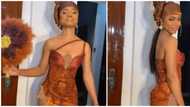 Wedding fashion: Asoebi lady receives criticisms online over revealing dress in viral video