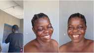 Nigerian mum lights up social media with priceless smile as son takes photos of her, stirs reactions