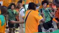 AFCON: Happy Cote d'Ivoire fans mob white man rocking Nigerian jersey, refuses to let him be