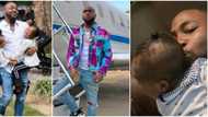 Davido performing daddy duties to his 3 children in 5 adorable photos