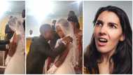 Was she forced? Nigerians react as unhappy bride dodges groom's lips, refuses to kiss him in viral video
