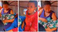"Na inside bank I wan born": Video goes viral as Nigerian woman gives birth in crowded market