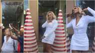 Liquorose dances for fans as they surprise ex-housemate with money cakes taller than her during meet and greet