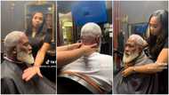 "Where is she located?" Beautiful lady massages man's hand & neck, barbs his hair like pro