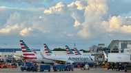 American Airlines reports smaller loss, sees travel demand improving