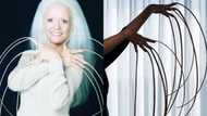 Lee Redmond: Meet woman with longest fingernails; she can brush, cook and make-up with ease