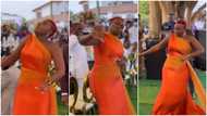 Na fight? Reactions as lady in gown makes serious facial expression as she dances at wedding ceremony in video