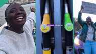 "I spend N79k daily on fuel": Lady driving from London to Lagos seen buying fuel at filling station