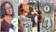 Nigerian lady shares photos of old Biafran notes found in father's house, many people react