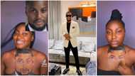 "Baba you don see wife": Fans react as young lady uses Makeup to draw Alex Ekubo on her chest, clip goes viral