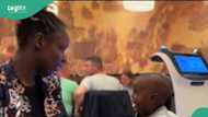Little boy assumes Robot waitress is going to attack him in a restaurant, he reacts