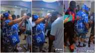 Pretty lady becomes so serious as she sprays man money at party, video raises questions
