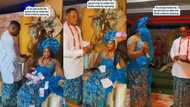 "Until the money finish": Bride refuses to smile after husband sprays his money, friends join to help