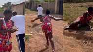 Lady chases after man who disappeared after giving her N100,000 cash on the road, video goes viral