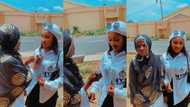 "Mama no dey miss class": Nigerian grandma signs on granddaughter's shirt after NYSC, video goes viral