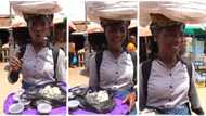 "She was a teacher": Lady selling Ogiri in the street uses sweet Queen's English to market it