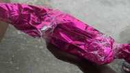 Mixed reactions as lady receives cutlass as gift on her wedding day
