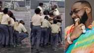 "OBO too humble": School children over the moon as they hug and take photos with Davido