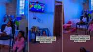 "They go still break am": Mum of 2 kids hangs television high on wall, mixed reactions trail video