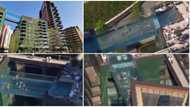 Incredible video shows people swimming in world's first transparent pool built between 2 skyscrapers