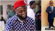 Which kine shoe be this? Reactions as Davido shares rare throwback photo of himself as a kid, rocks suit, tie