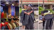 Lovely video shows proud Nigerian dad carry his grown-up daughter on his back after she bagged a first-class