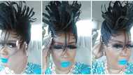 Lady proudly shows off peacock-styled hairdo, internet users react