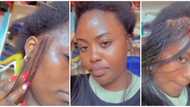 Video of lady installing 'million braids' sparks mixed reactions online