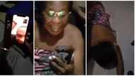 Mum on wrapper screams for joy, lays flat on the floor after her son cut his dreadlocks, video causes stir