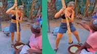"Is she killing a snake?" Video of oyinbo lady pounding yam with energy stirs massive reactions
