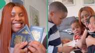 Nigerian woman rejoices as she and her two children become British citizens, get their passports