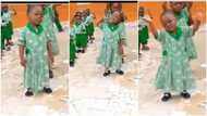Little girl pretends as if she's spiritual on assembly ground, waves her hands in air, video goes viral