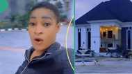“This is not Asokoro”: Nigerian lady shows off multimillion-naira mansion estate in her village