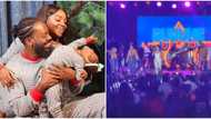 Awe-inspiring moment Adekunle Gold kissed wife Simi while performing at her concert, fans scream in excitement