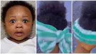 Make una let children grow small abeg: Reactions trail video of wig created for babies