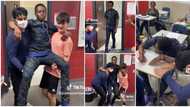 Oyinbo boys treat Nigerian kid like a king in class, carry and bow to him in funny video, stirs reactions