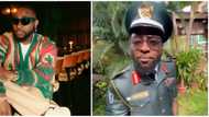 Davido dons military uniform for drink commercial amid pregnancy scandal: "Father Abraham of our time"